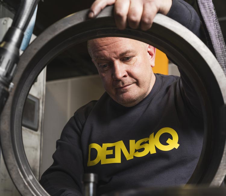 Man with Densiq logo on the shirt